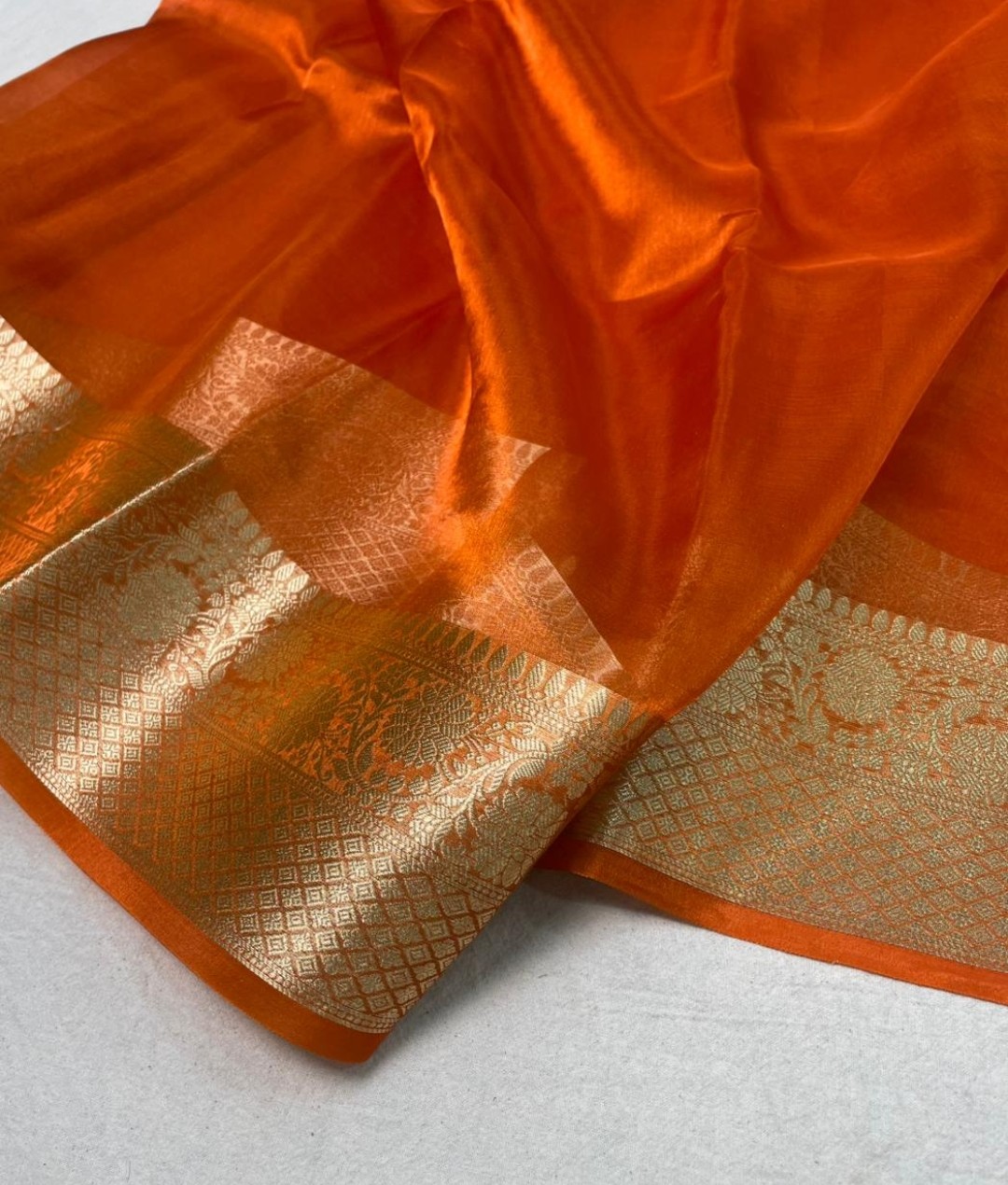 Rust orange Pure tissue silk saree